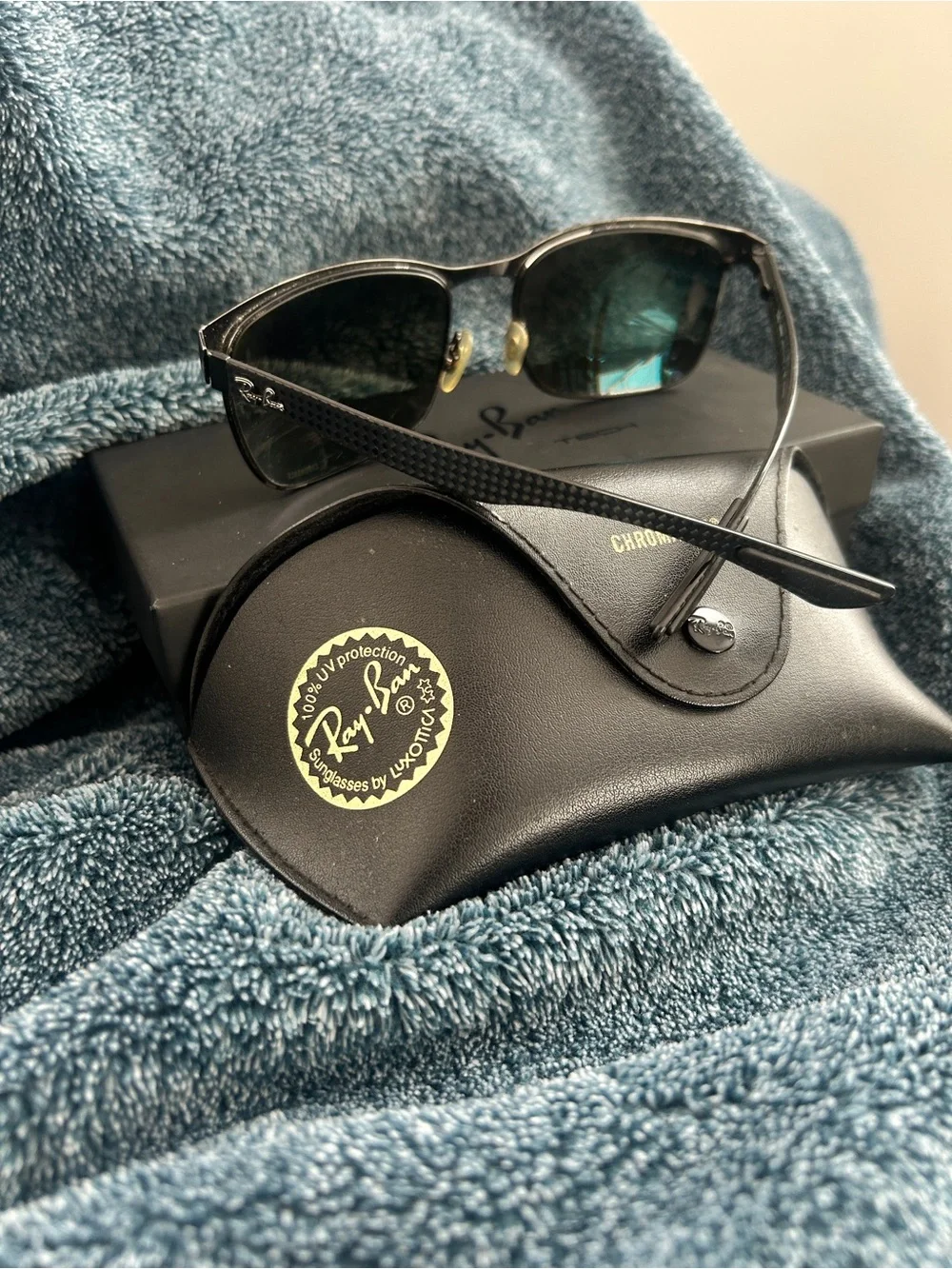 Ray-Ban Black Sunglasses with Silver Lenses